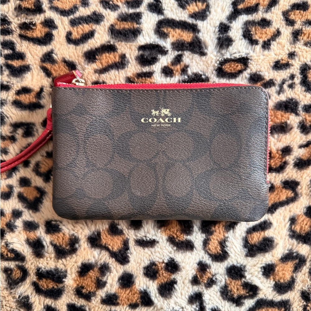 Coach Dark Brown Wristlet with Red Trim